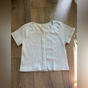 woman’s cropped blue top for boutique